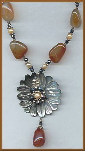 Morning Sun Black Flower Carnelian Necklace