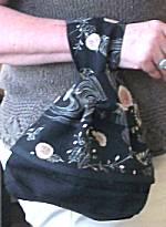 Nagomi Wrist Bag Text